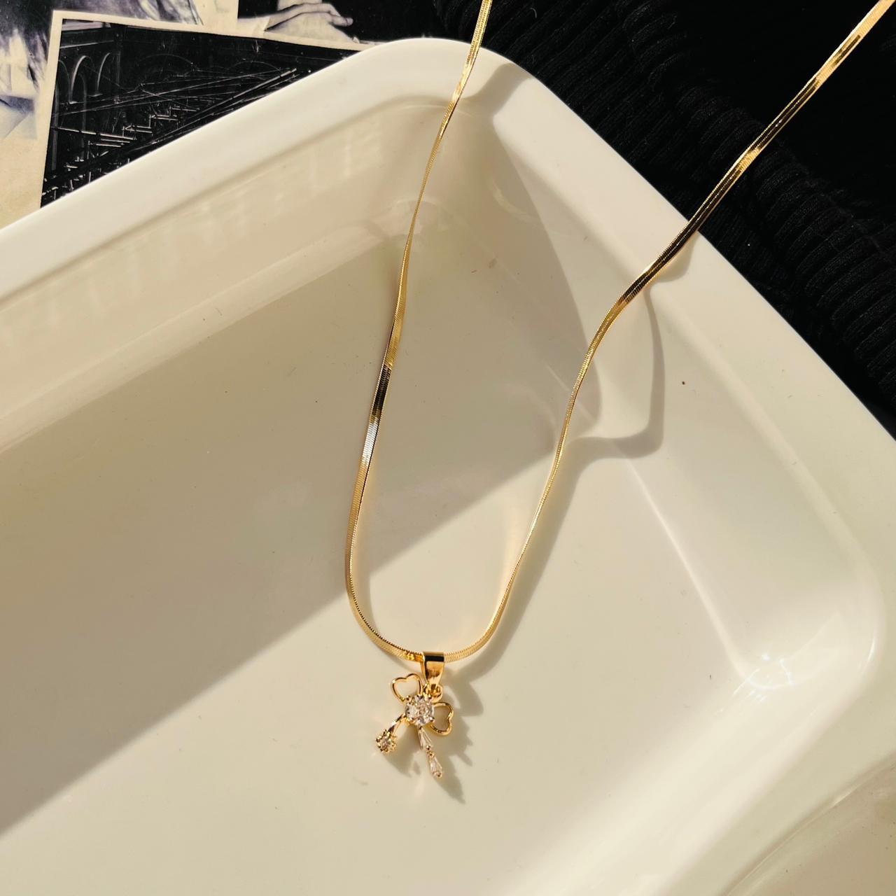 Bow Ecstacy Necklace