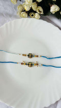 Peacock Feathers Rakhi Pair