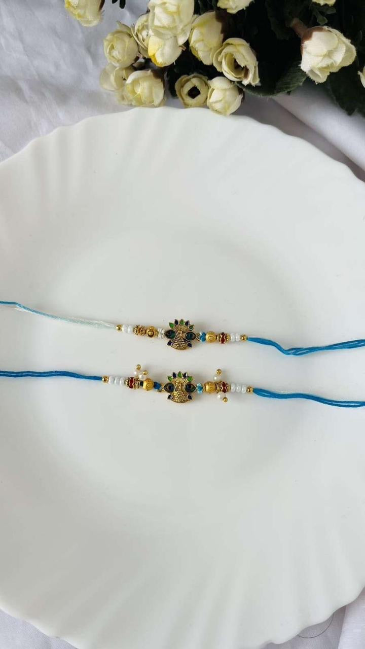 Peacock Feathers Rakhi Pair