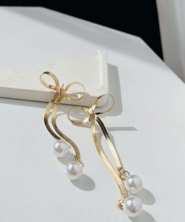 Elongated Bow Pearl Earrings