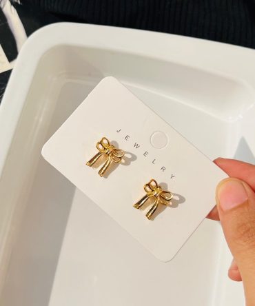 Bow Strings Attached Earrings